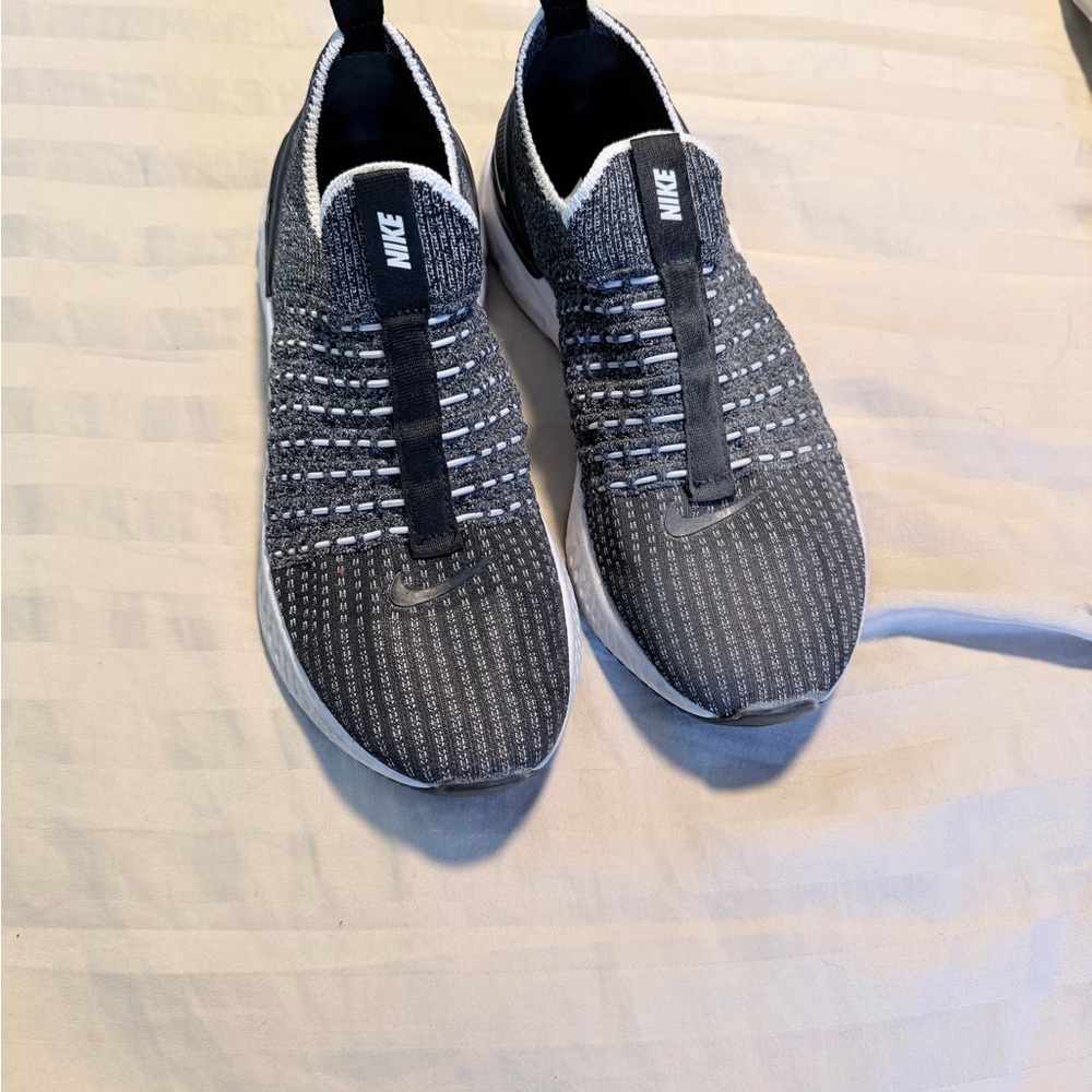 Nike Women’s Black and White Knit Slip-On Running Shoes